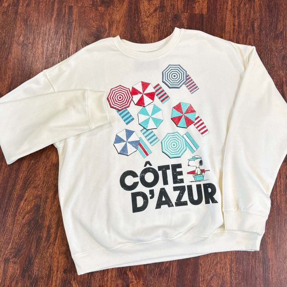 Peanuts Snoopy Cote d'Azur Beach Graphic Cream Crewneck Sweatshirt